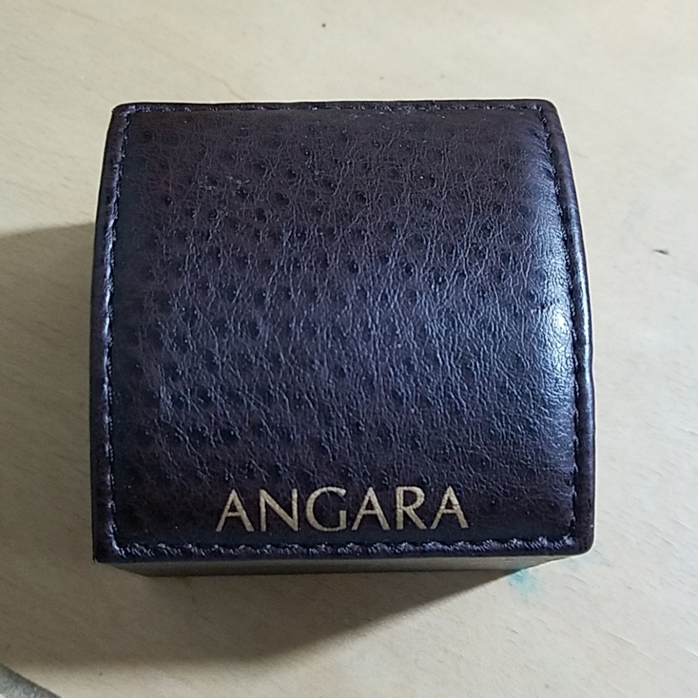 Genuine Ruby ear studs by Angara